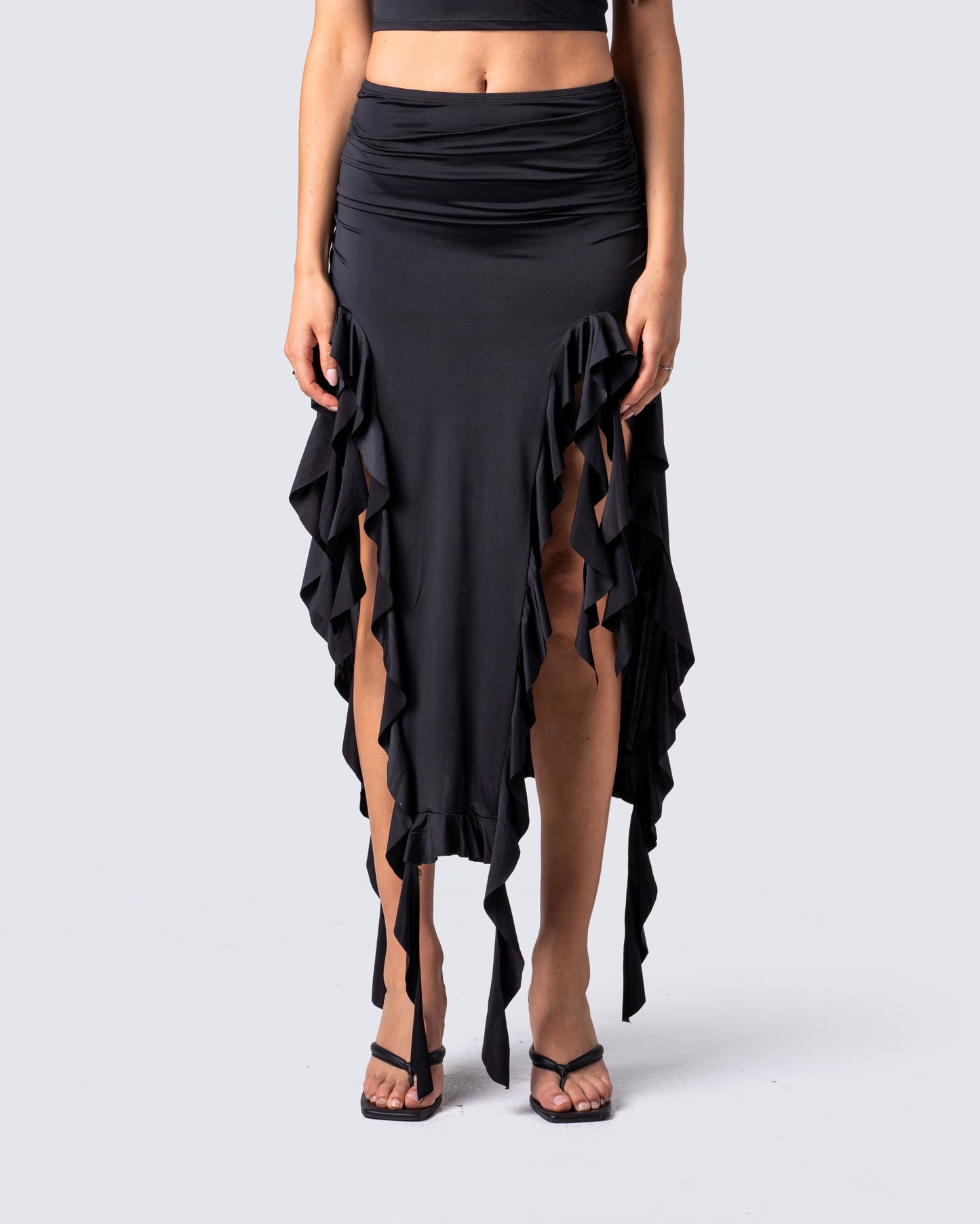 Veeti Black Jersey Ruffle Skirt model front