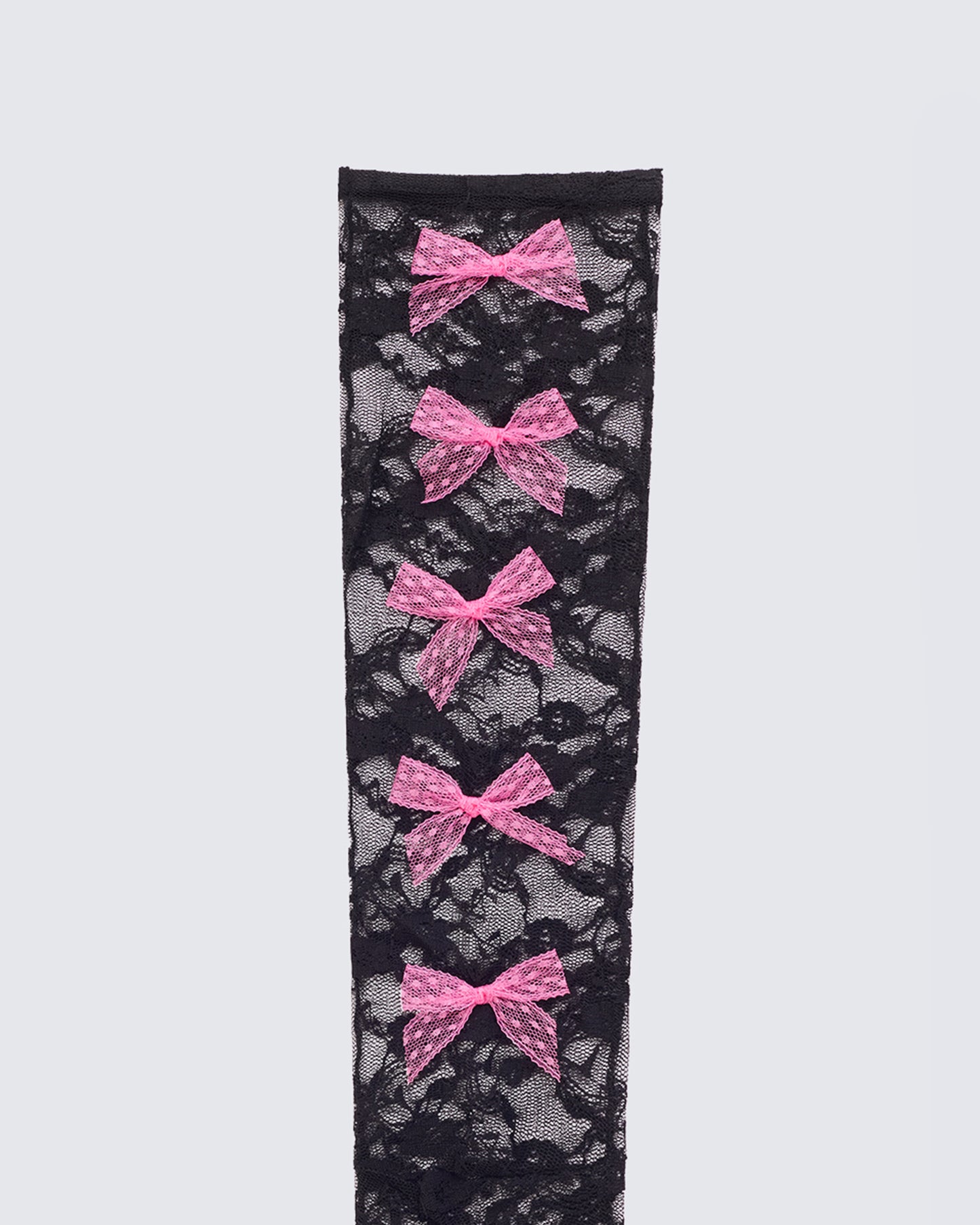 Women's black accessories styled on model – FINESSE