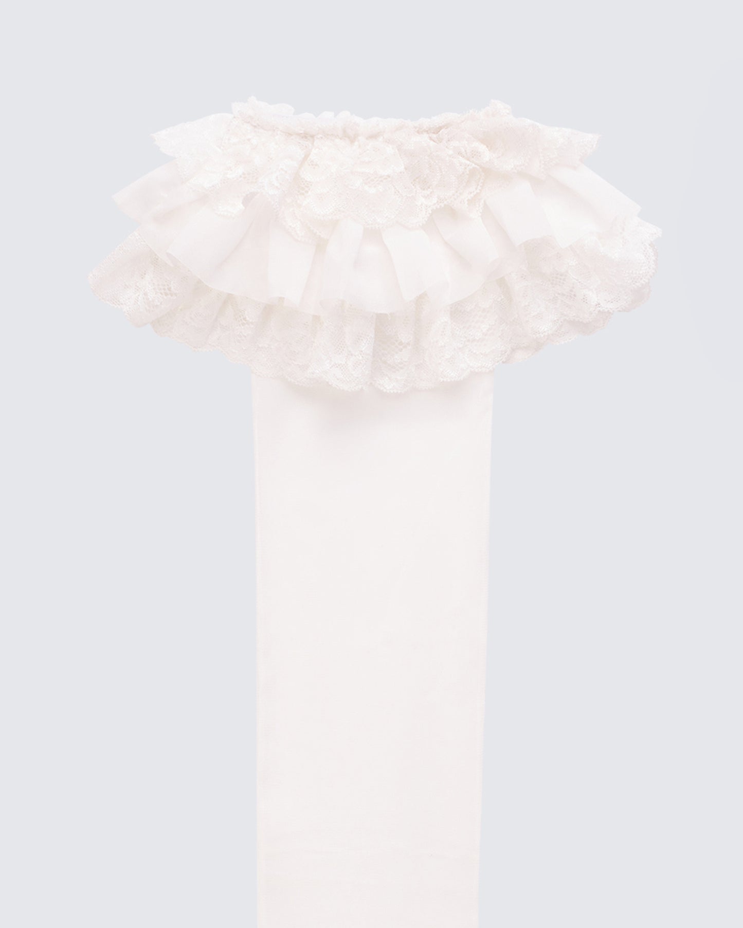 Women's white accessories styled on model – FINESSE