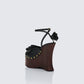 Women's black wedge sandals styled on model – FINESSE