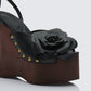 Women's black wedge sandals close-up detail – FINESSE