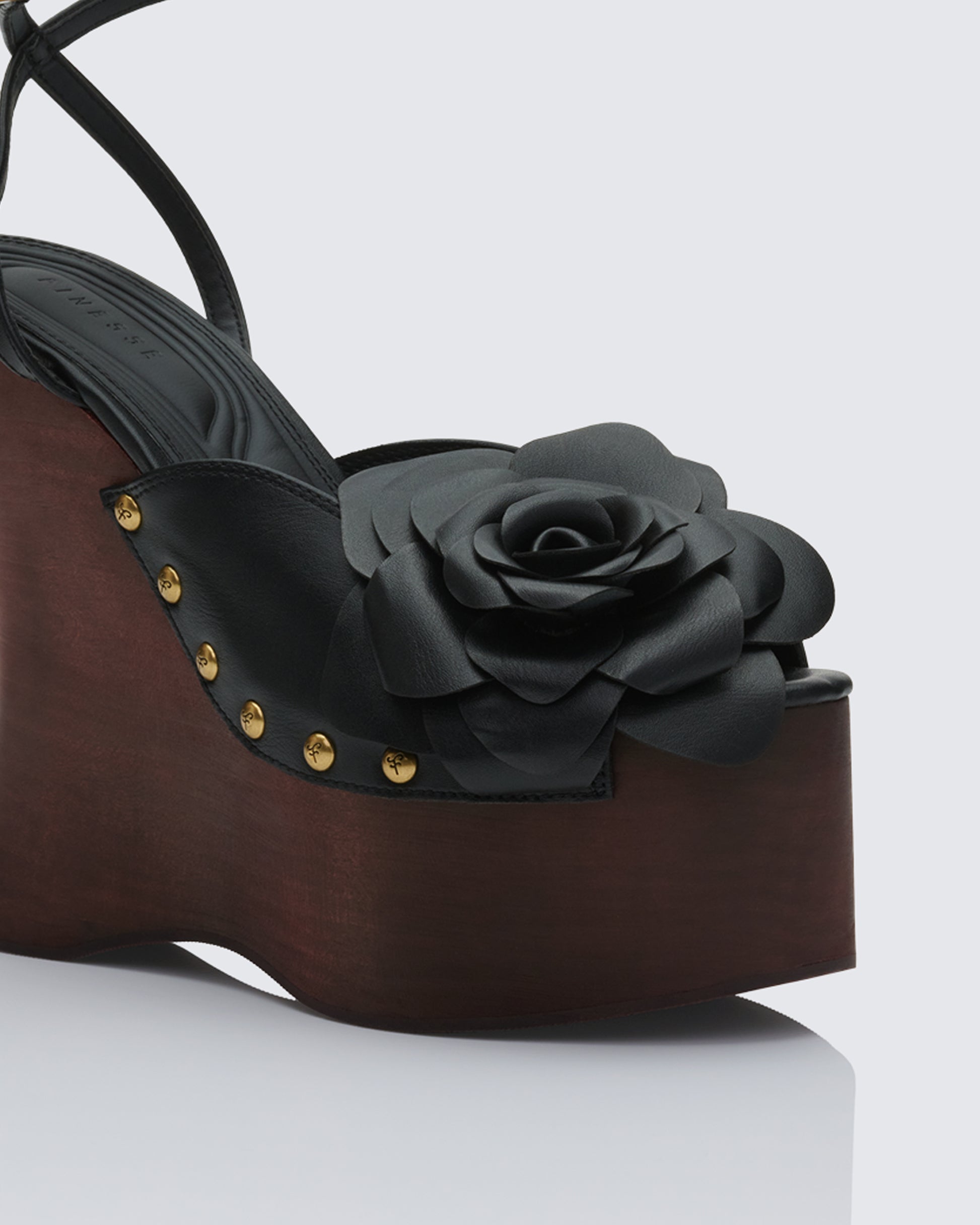 Women's black wedge sandals close-up detail – FINESSE