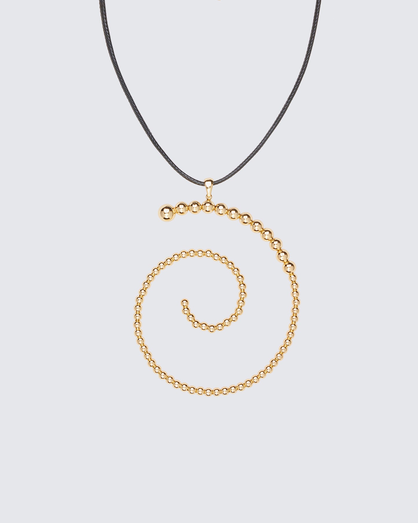 Calypso Gold Beaded Swirl Necklace - on model