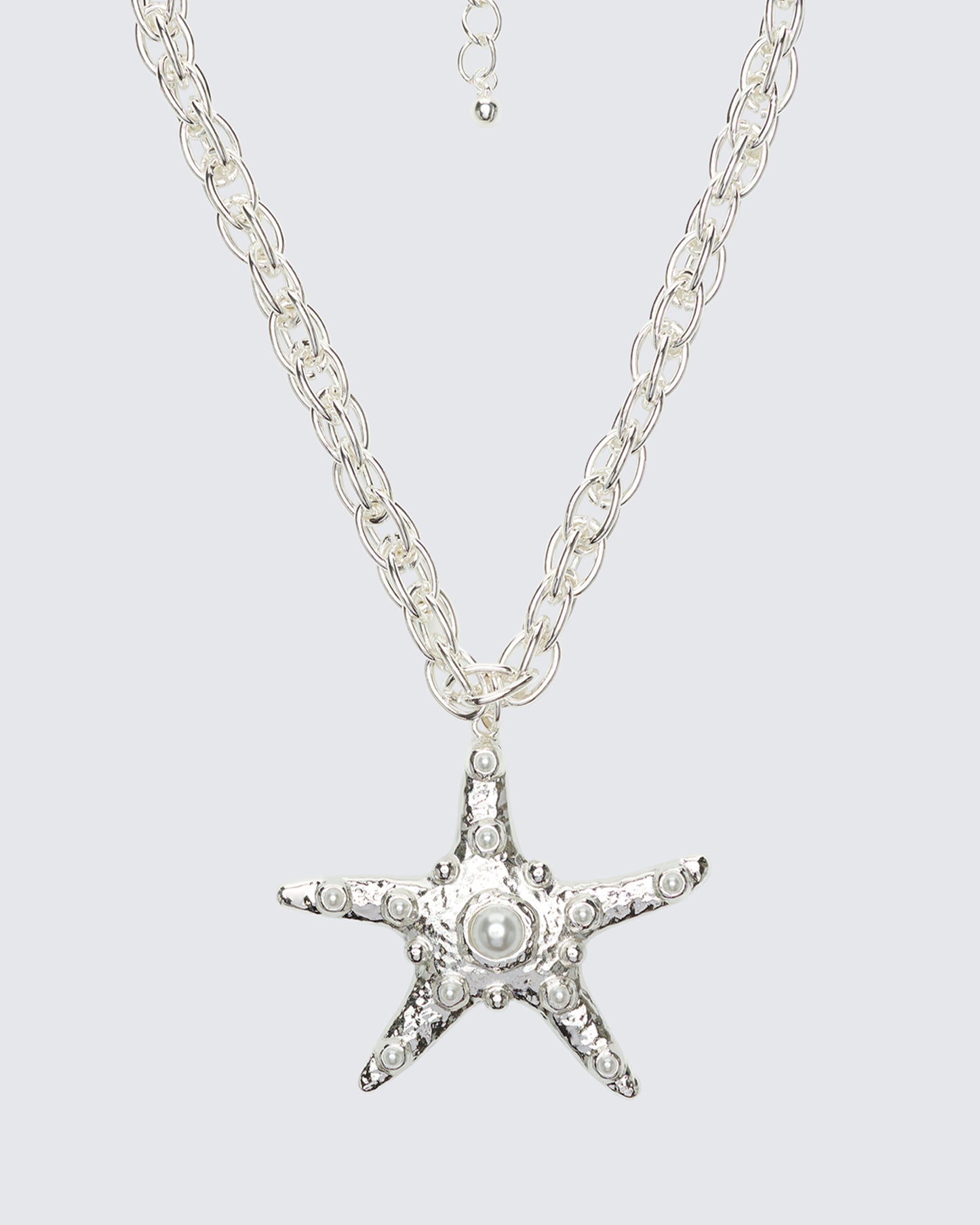 Ghalia Silver Molten Starfish Pendant Necklace - close up detail