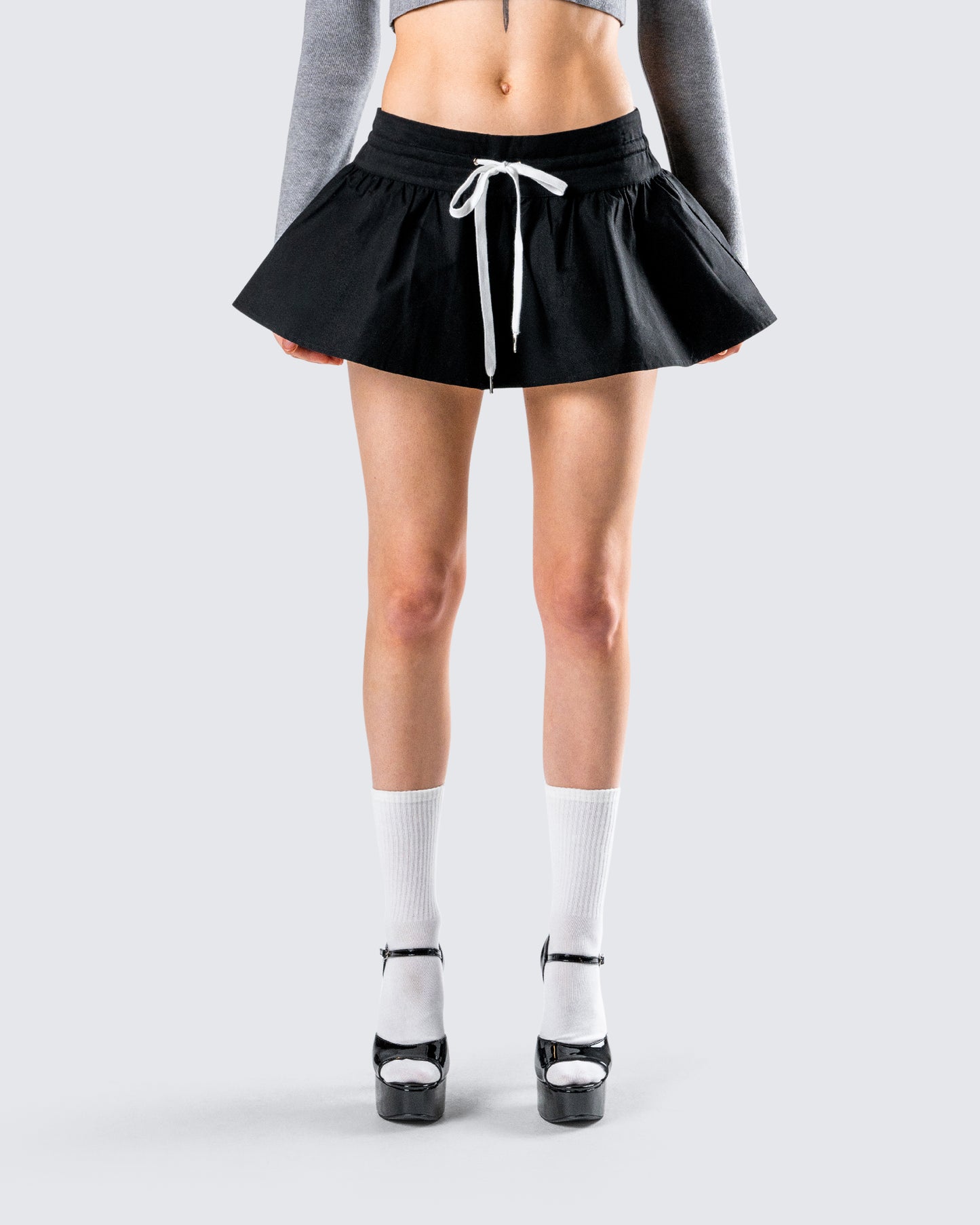 Kata Black Flounce Mini Skirt model front