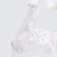 White shoulder bag styled on model – FINESSE