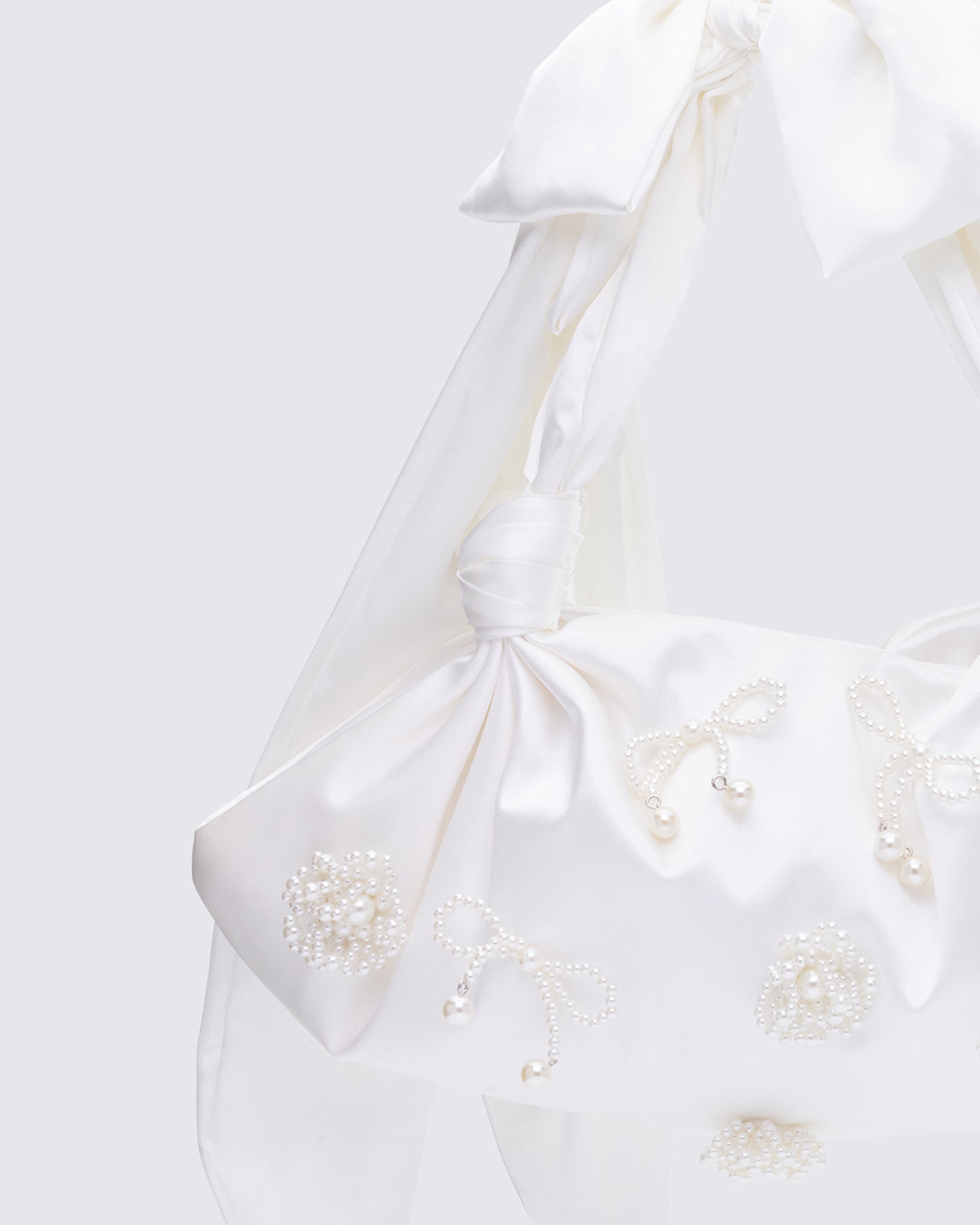 White shoulder bag styled on model – FINESSE