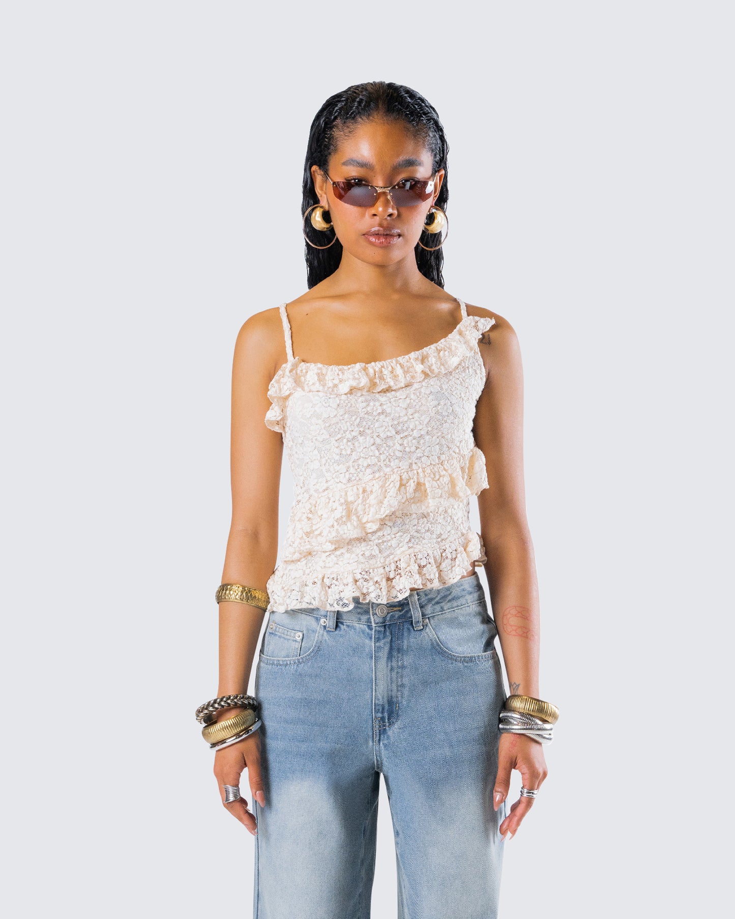 Lari Ivory Asymmetrical Ruffle Top model front
