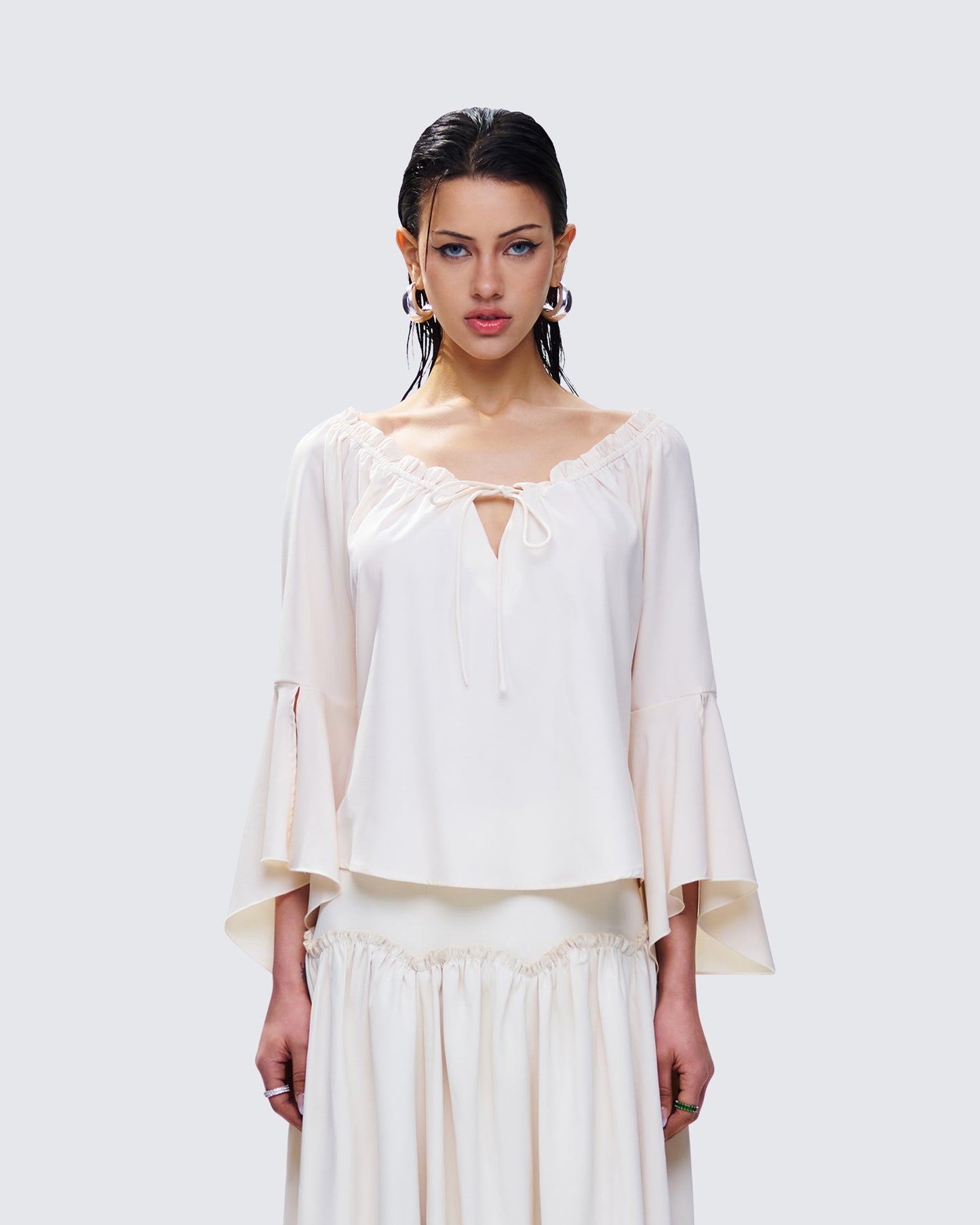 Moira Ivory Trumpet Sleeve Top model front