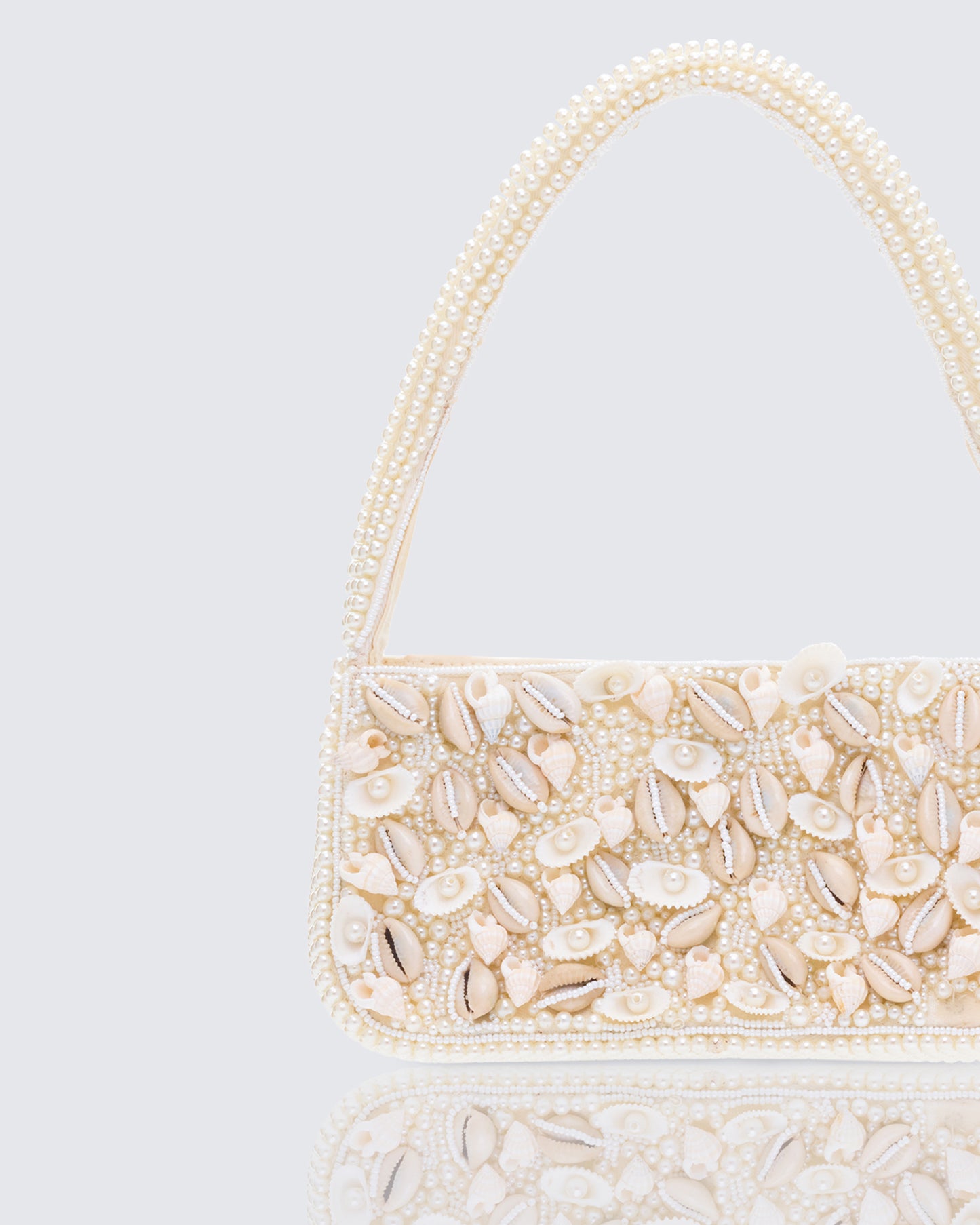 Sadaf Ivory Cowrie Shell Handbag - close up detail