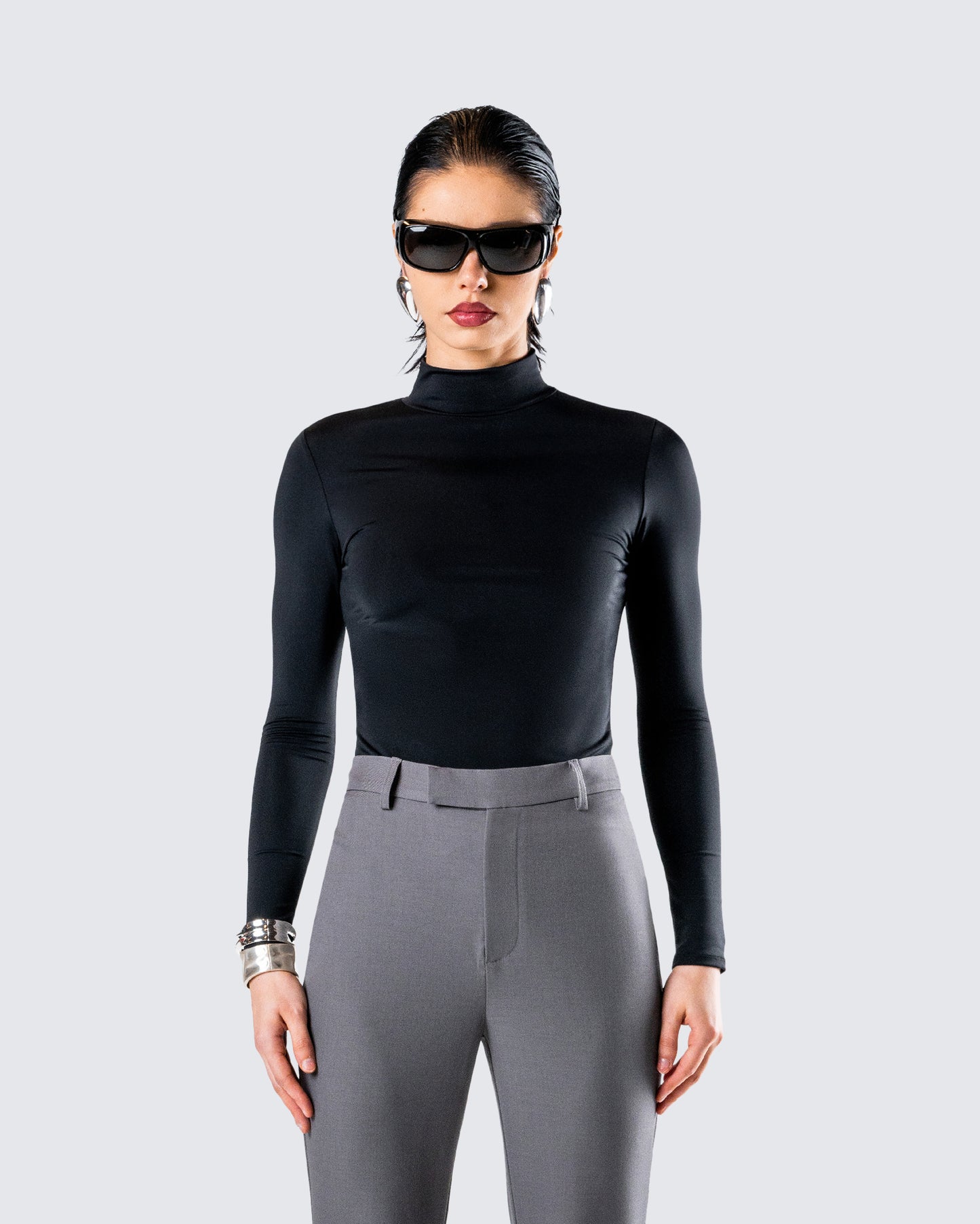 Tana Black Mockneck Top model front