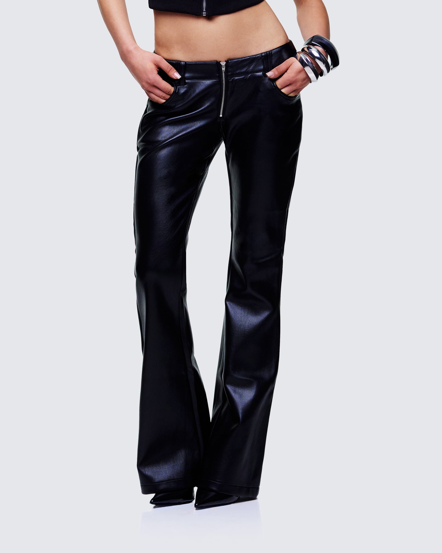 Women's black pants styled on model – FINESSE