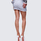 Women's red cotton mini skirt close-up detail – FINESSE