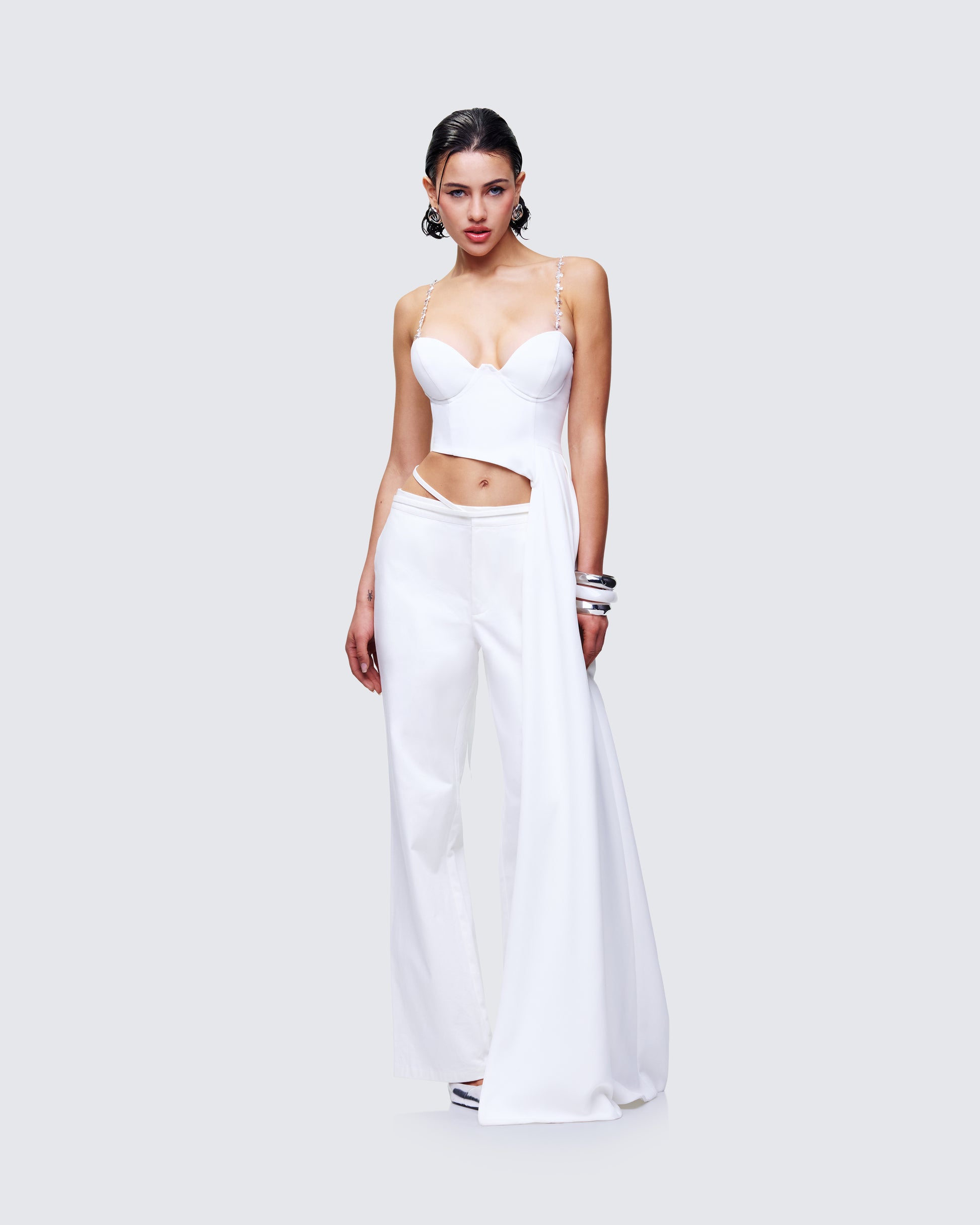 Women's white top styled on model – FINESSE