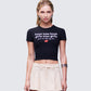 Hema Black Slogan Baby Tee model front