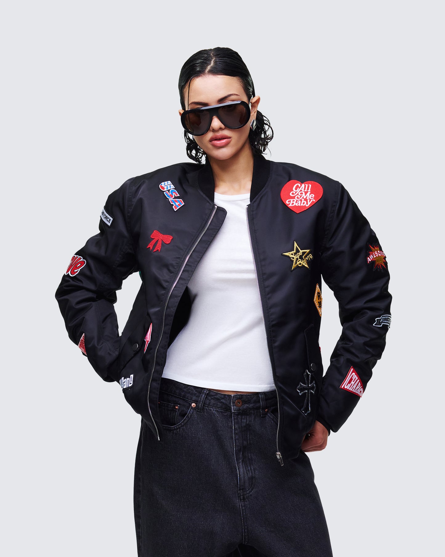 Women's black outerwear styled on model – FINESSE