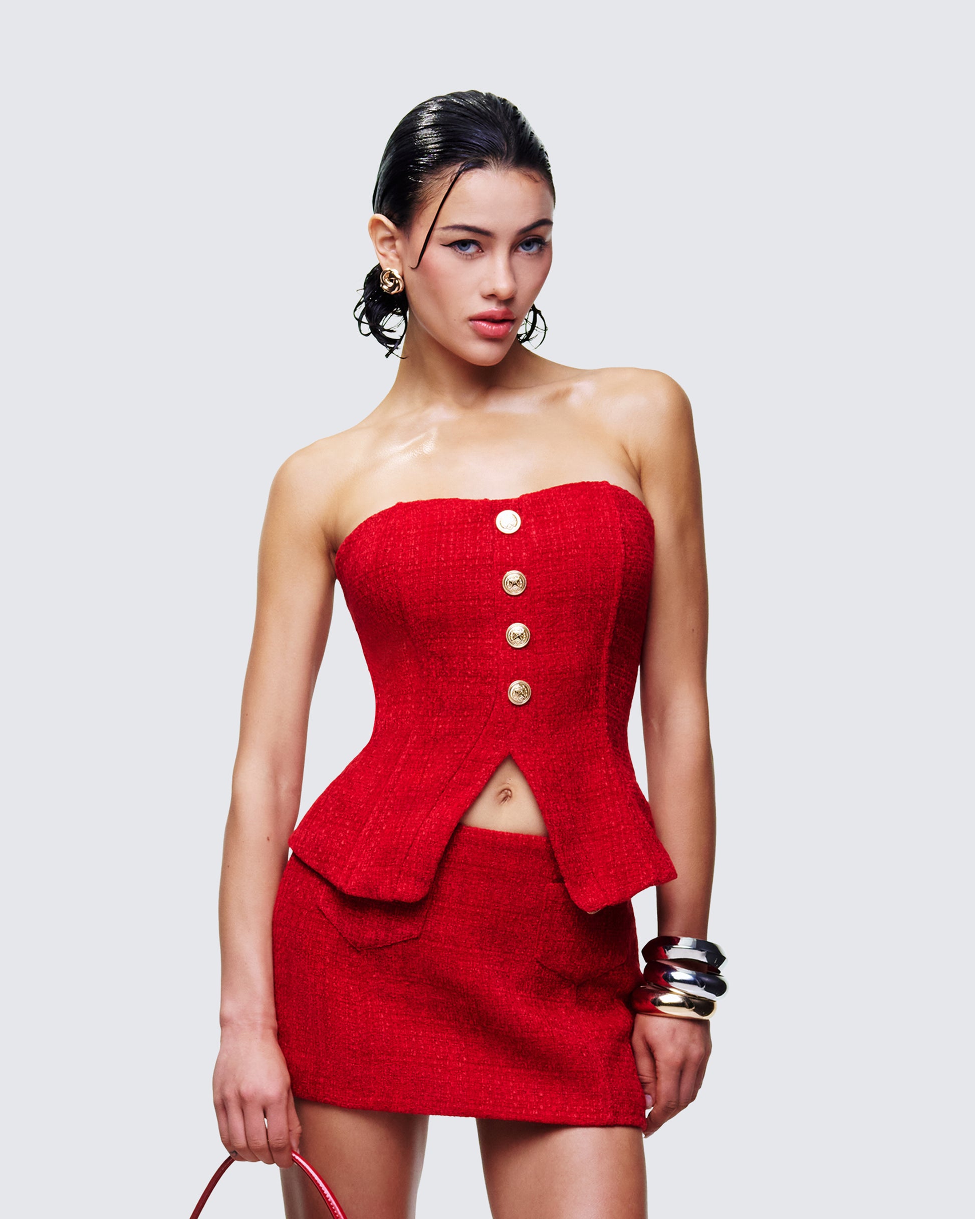 Women's red top styled on model – FINESSE