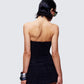 Women's black top close-up detail – FINESSE