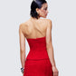 Women's red top close-up detail – FINESSE