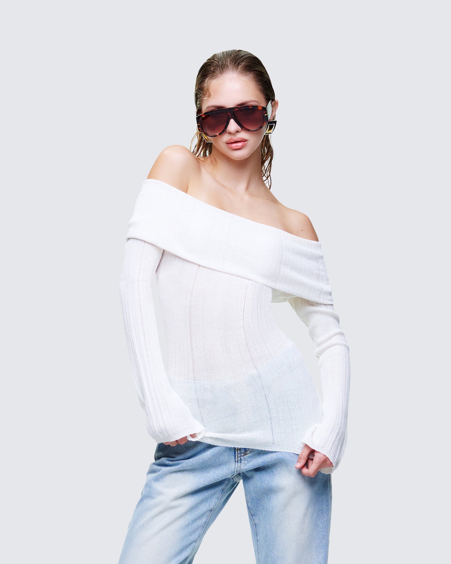 Women's white top styled on model – FINESSE
