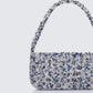 Silver shoulder bag styled on model – FINESSE