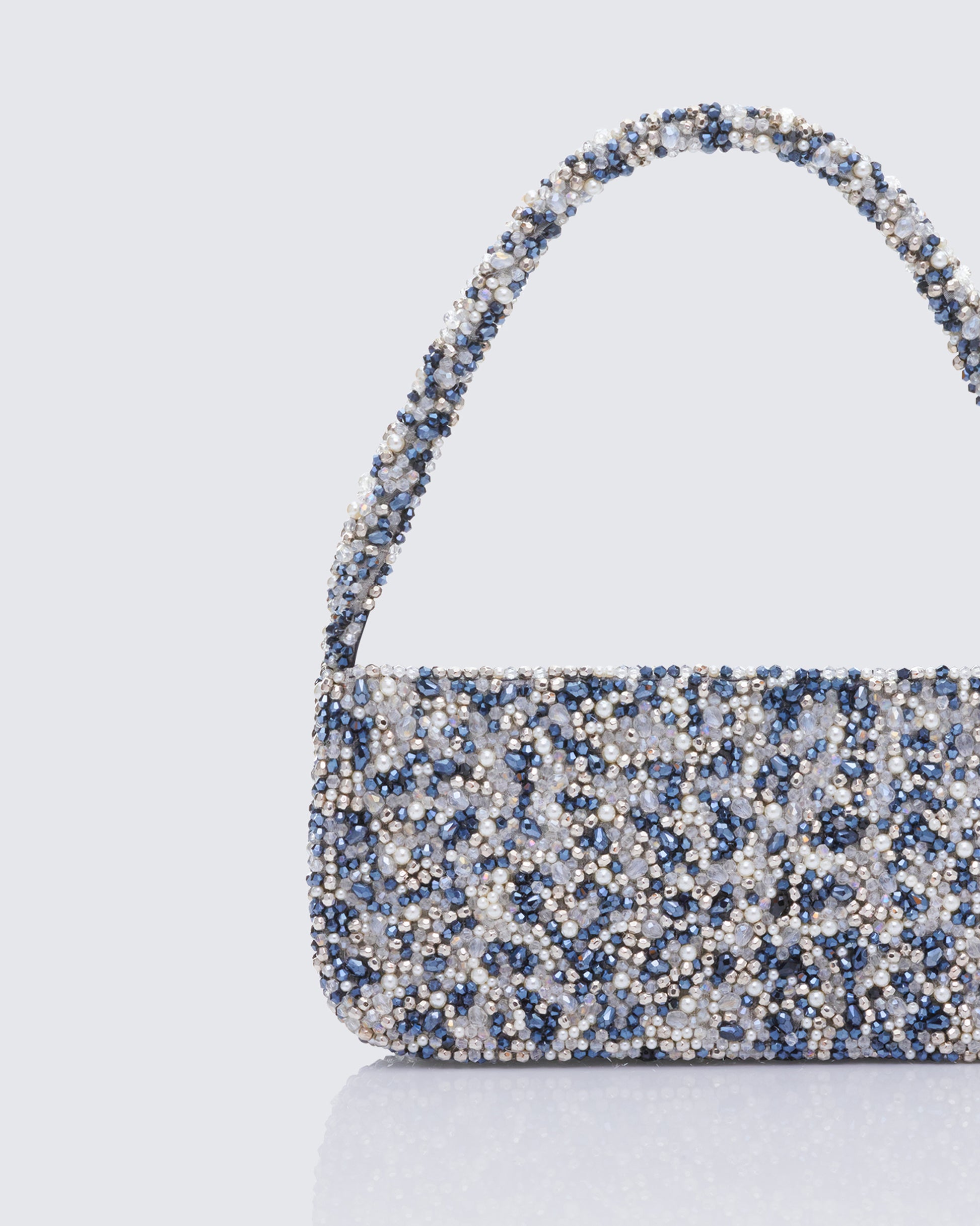 Silver shoulder bag styled on model – FINESSE