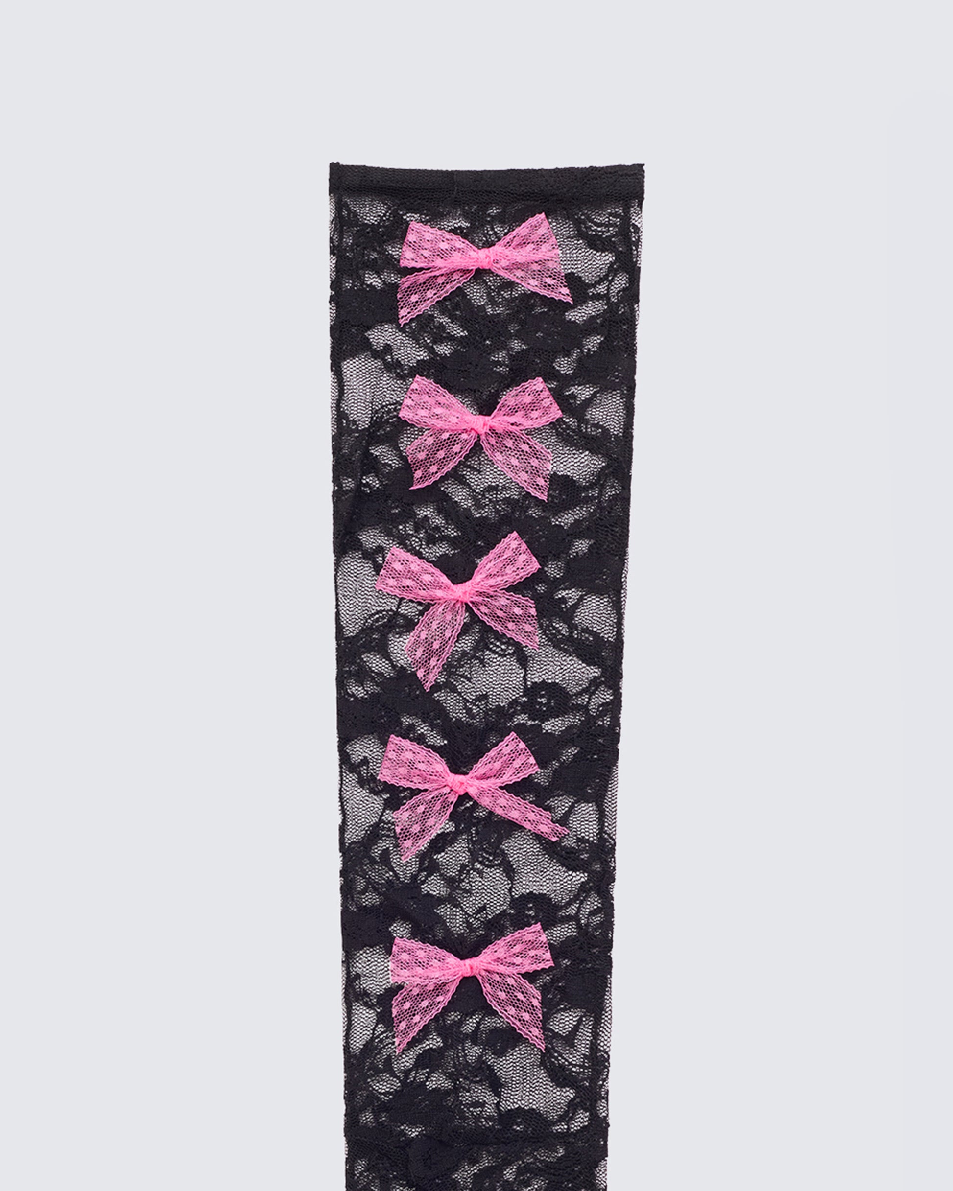 Women's black accessories styled on model – FINESSE