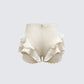 Becca Cream Ruffle Mini Shorts