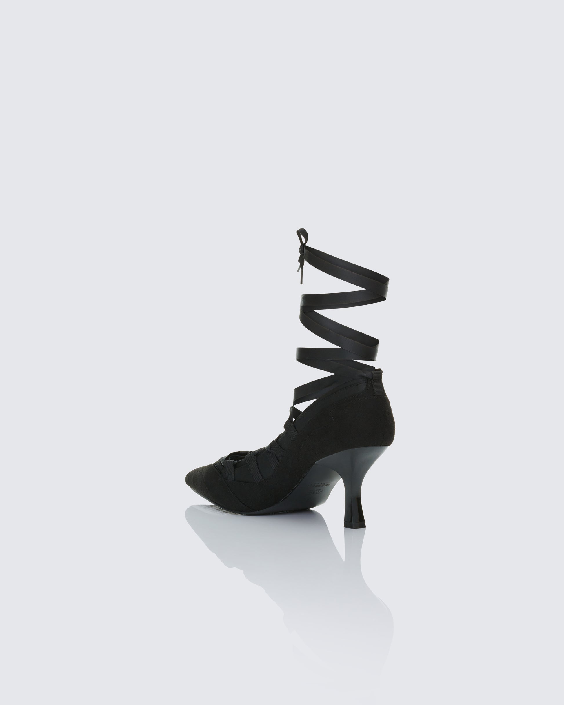 Women's black shoes styled on model – FINESSE