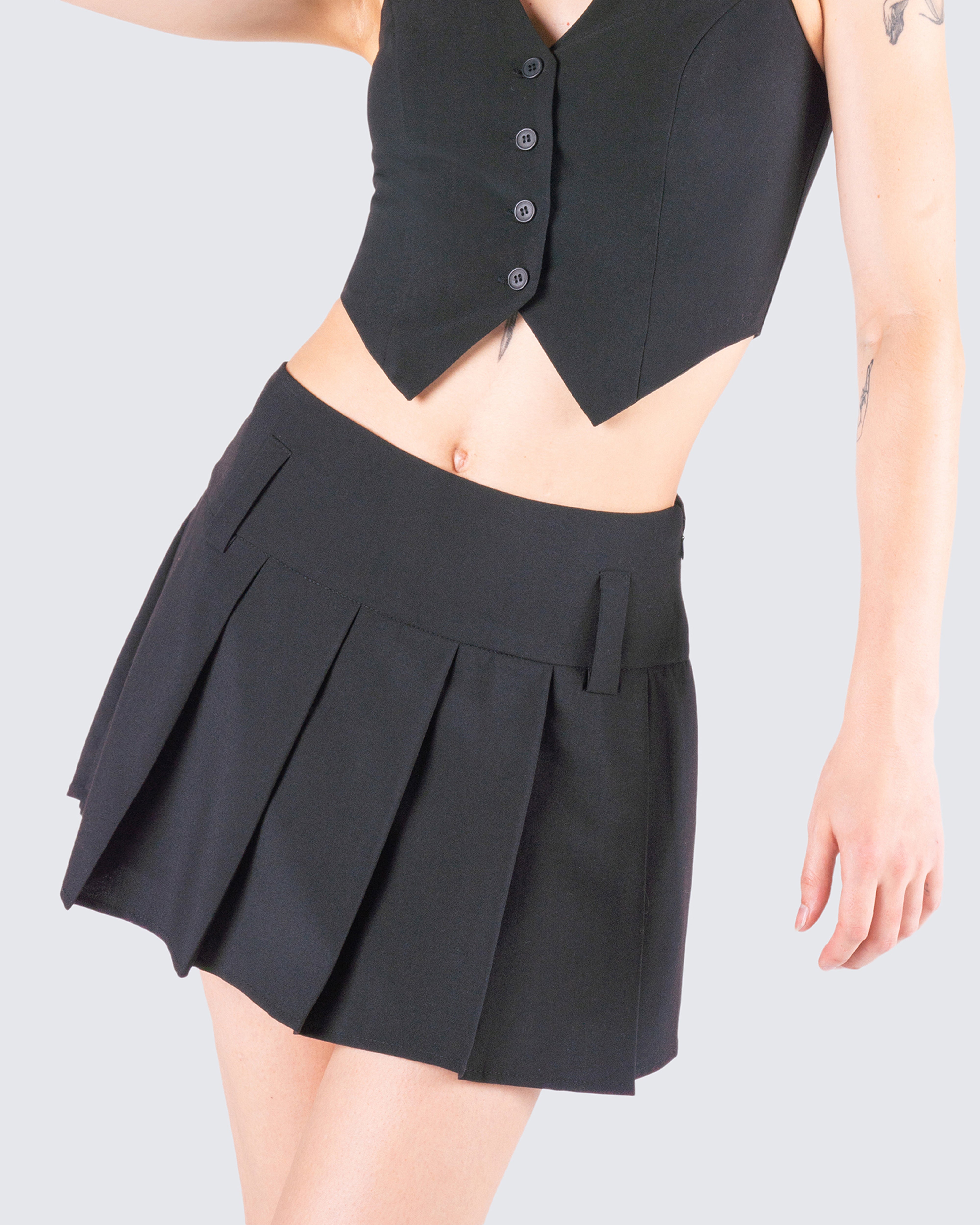 Black pleated mini skirt jumpsuit best sale