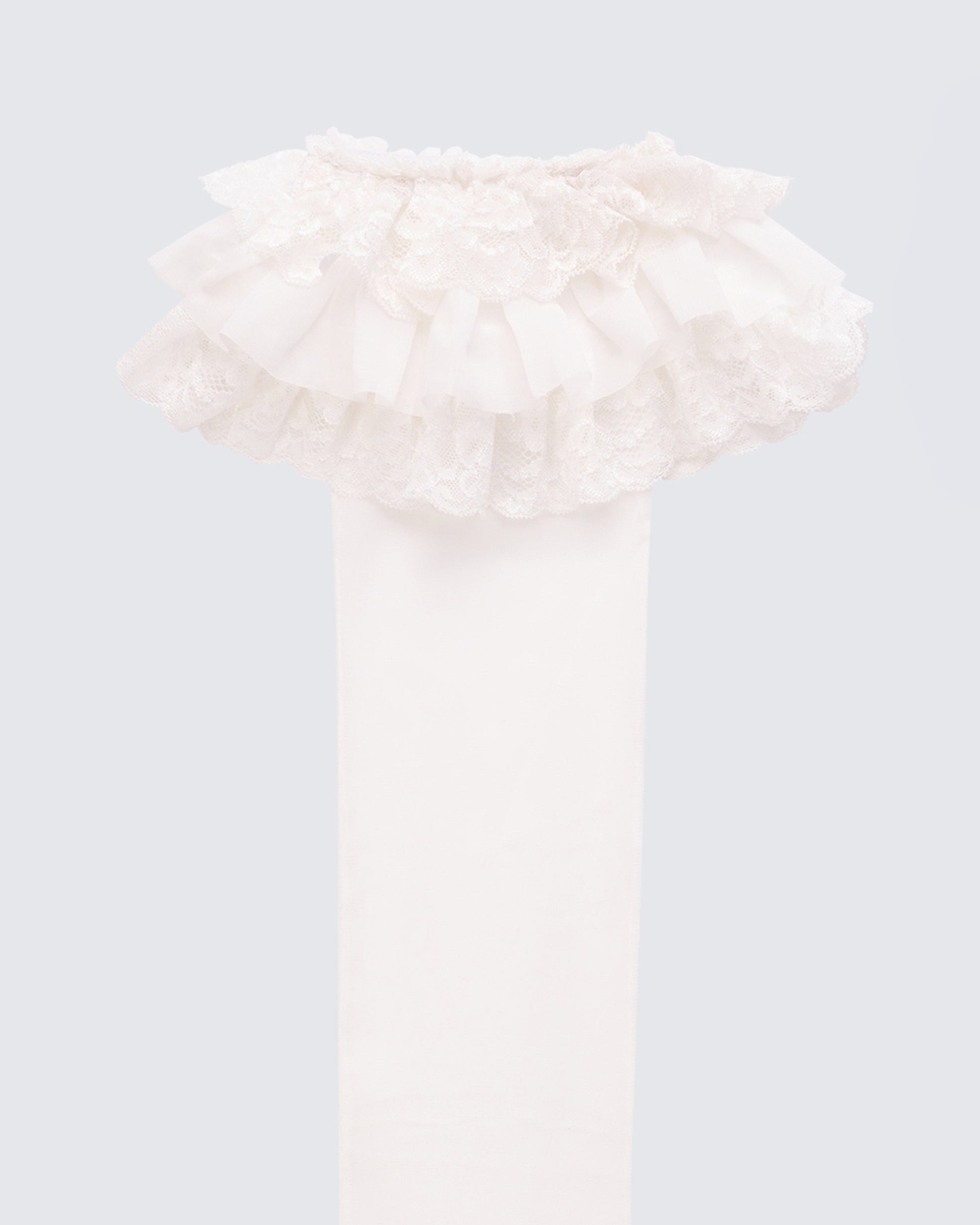 Women's white accessories styled on model – FINESSE