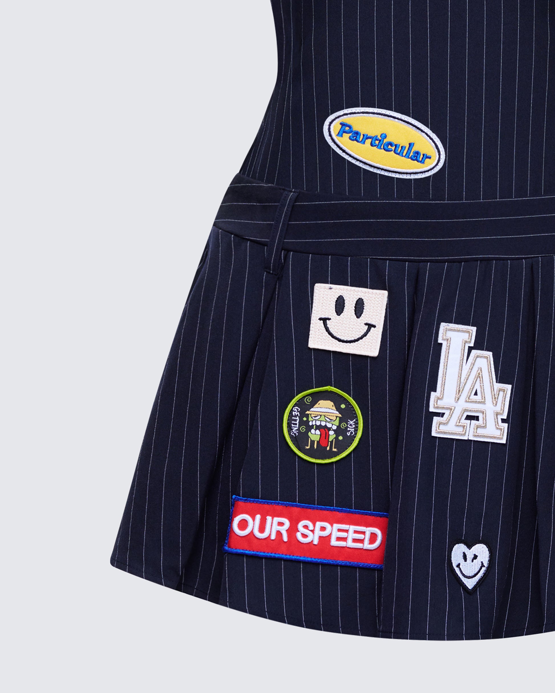 Navy Pinstripe Strapless Mini Dress with Patches FINESSE Navy Pinstripe Strapless Mini Dress with Patches FINESSE