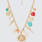 Eyelis Gold Summer Charm Necklace - on model