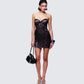 Women's black mini dress styled on model – FINESSE