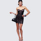 Women's black mini dress close-up detail – FINESSE