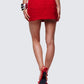 Women's red mini skirt close-up detail – FINESSE