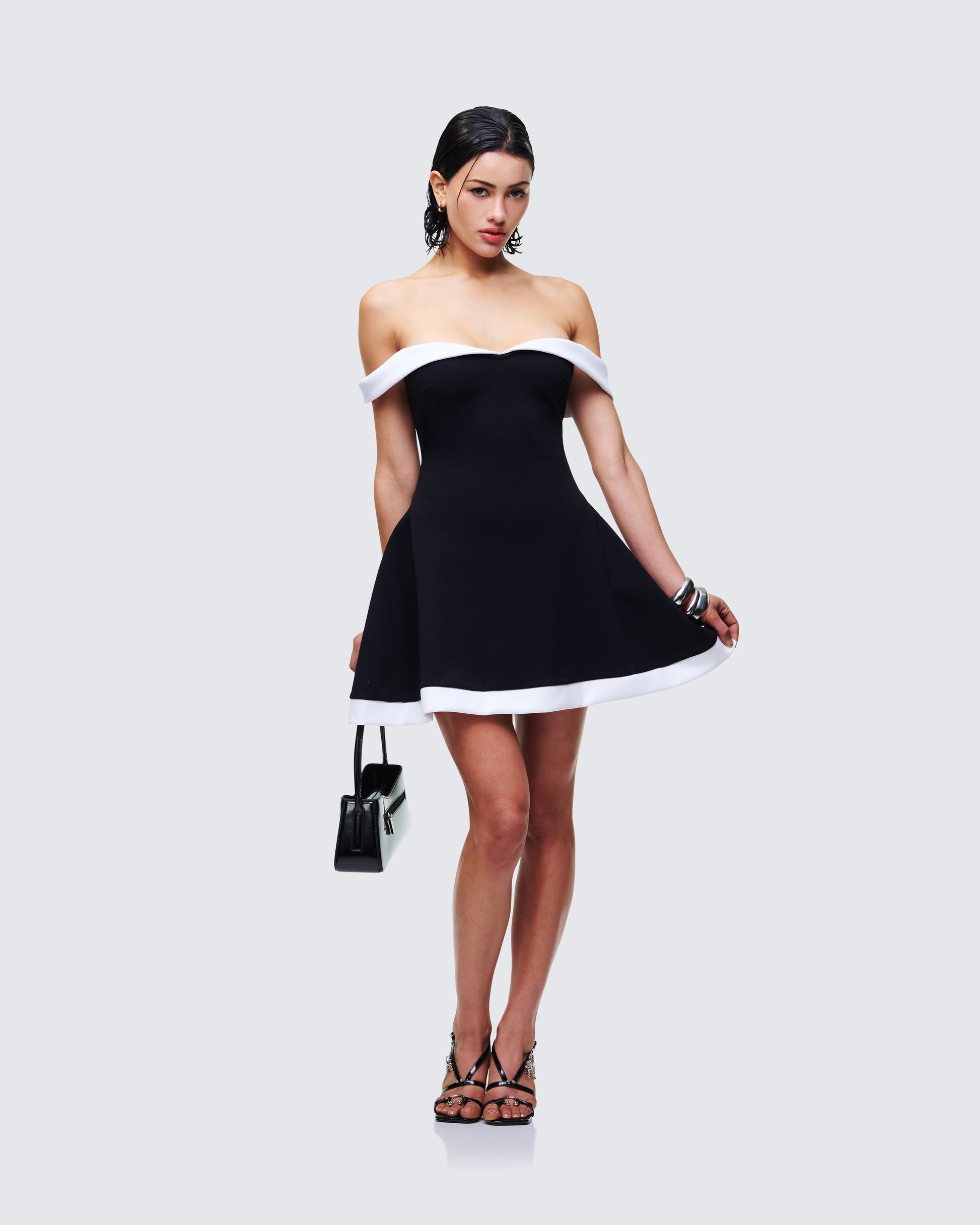 Women's black cotton mini dress close-up detail – FINESSE