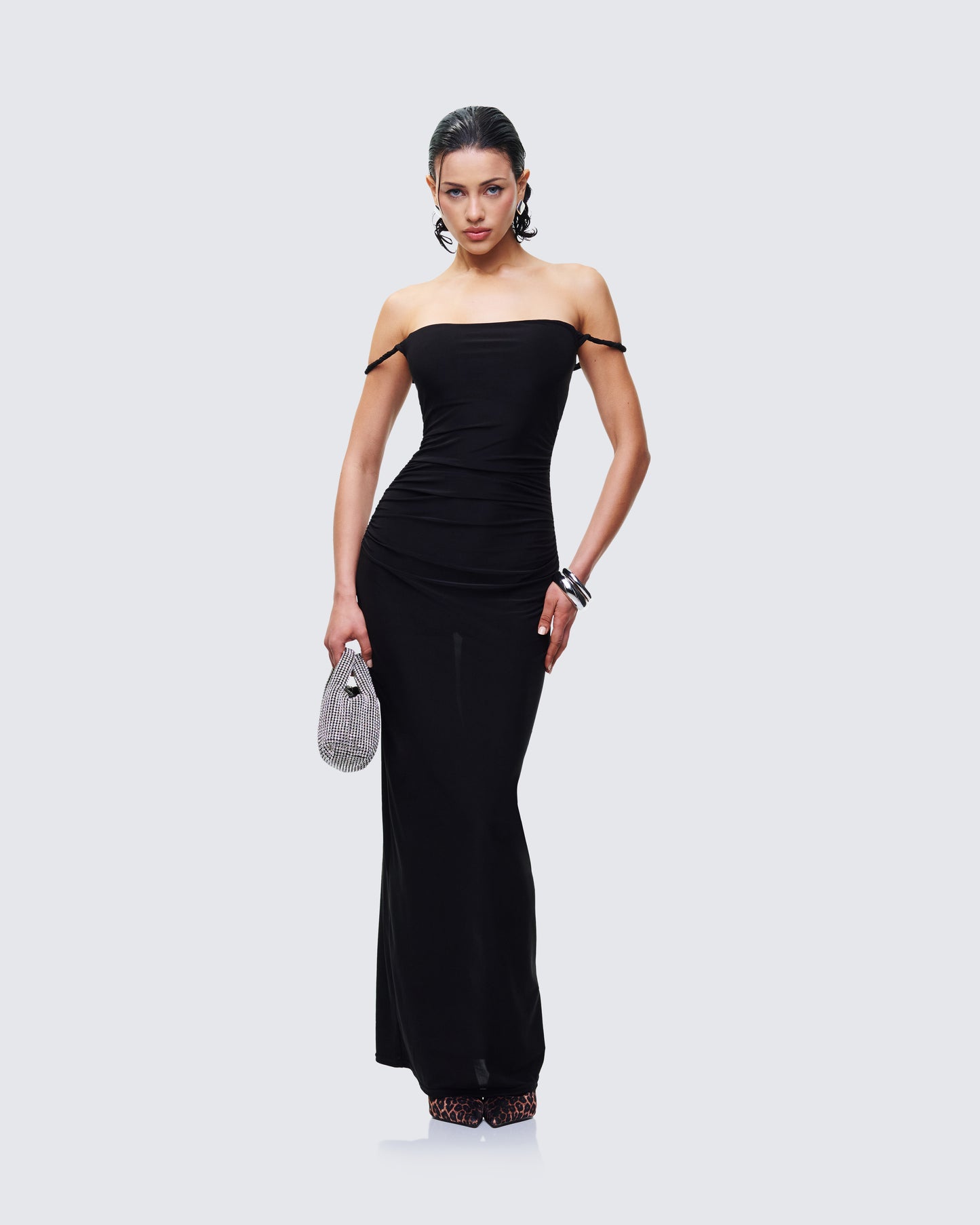 Women's black maxi dress styled on model – FINESSE