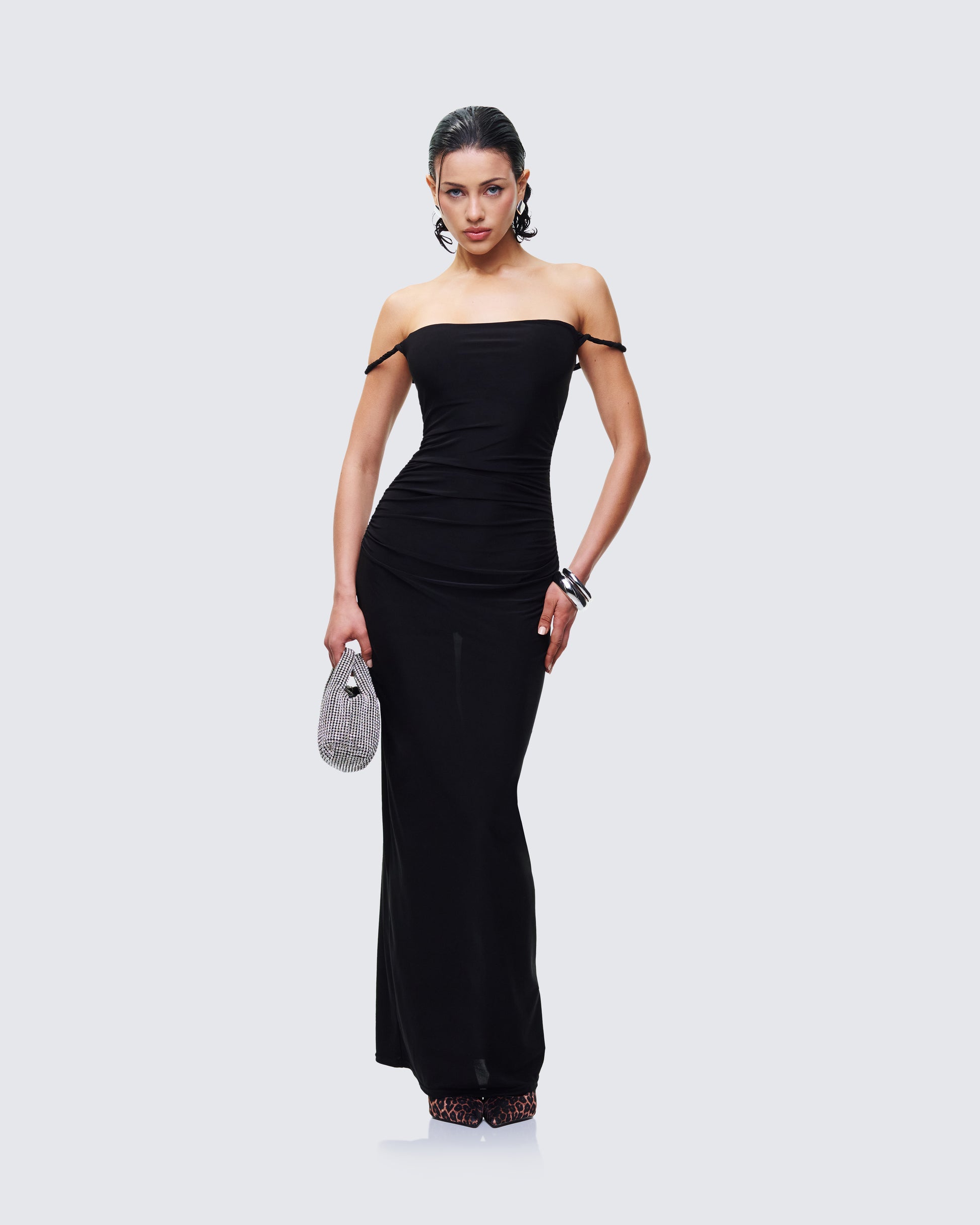 Women's black maxi dress styled on model – FINESSE
