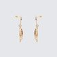 Pendientes colgantes de concha fundida de oro Kareina