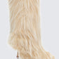 Women's white boots close-up detail – FINESSE