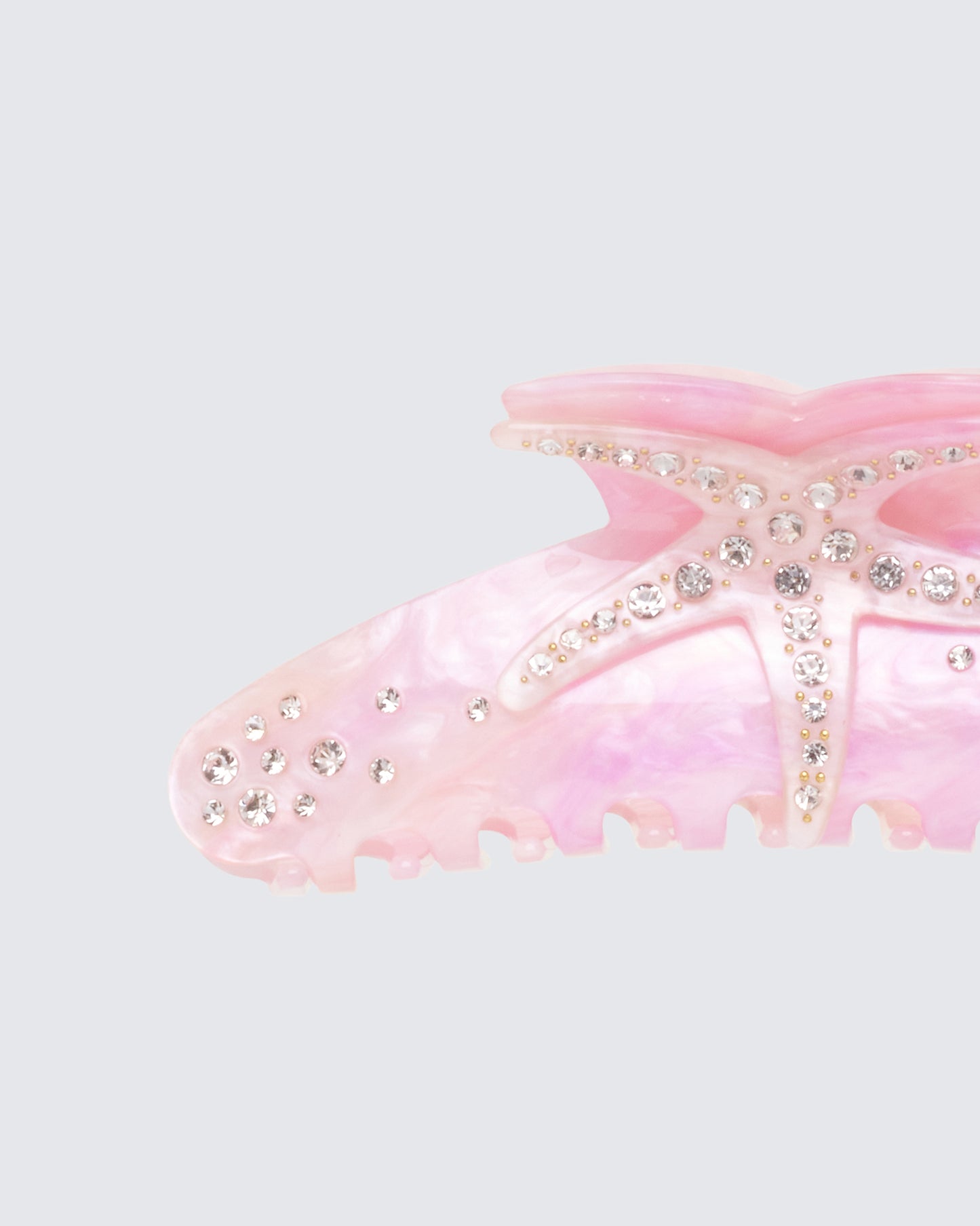 Women's pink accessories styled on model – FINESSE