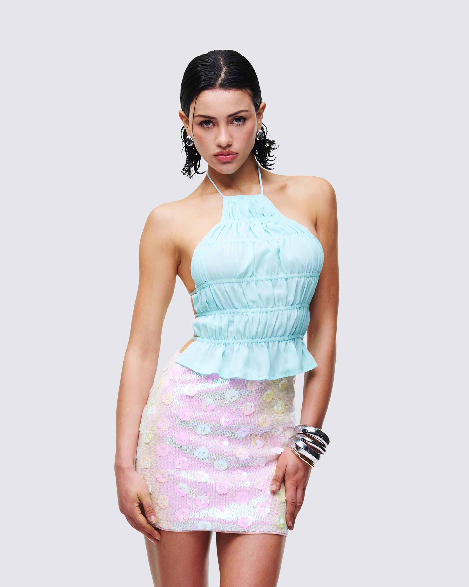 Women's blue halter top styled on model – FINESSE