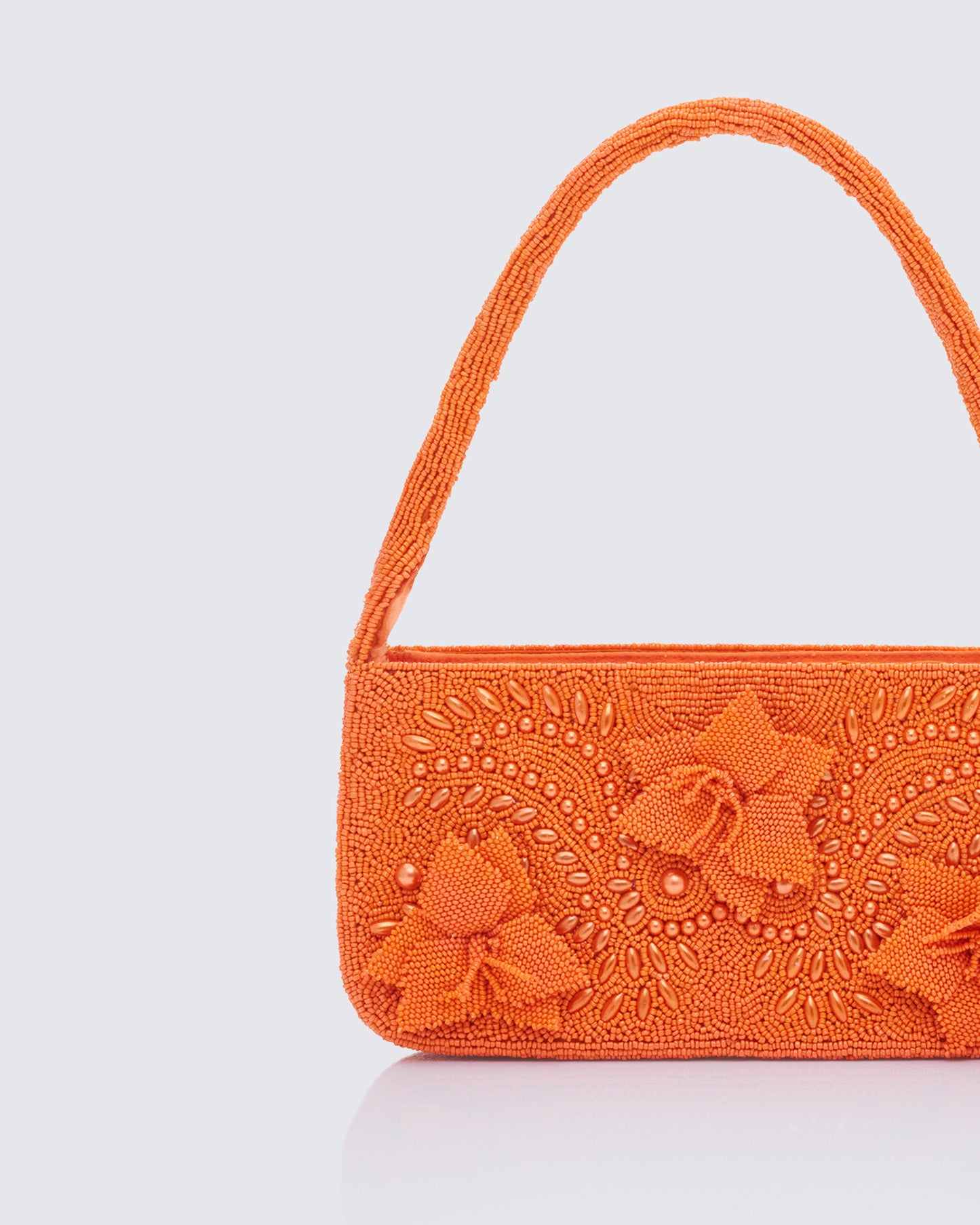 Orange shoulder bag styled on model – FINESSE