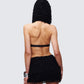 Women's black halter top close-up detail – FINESSE