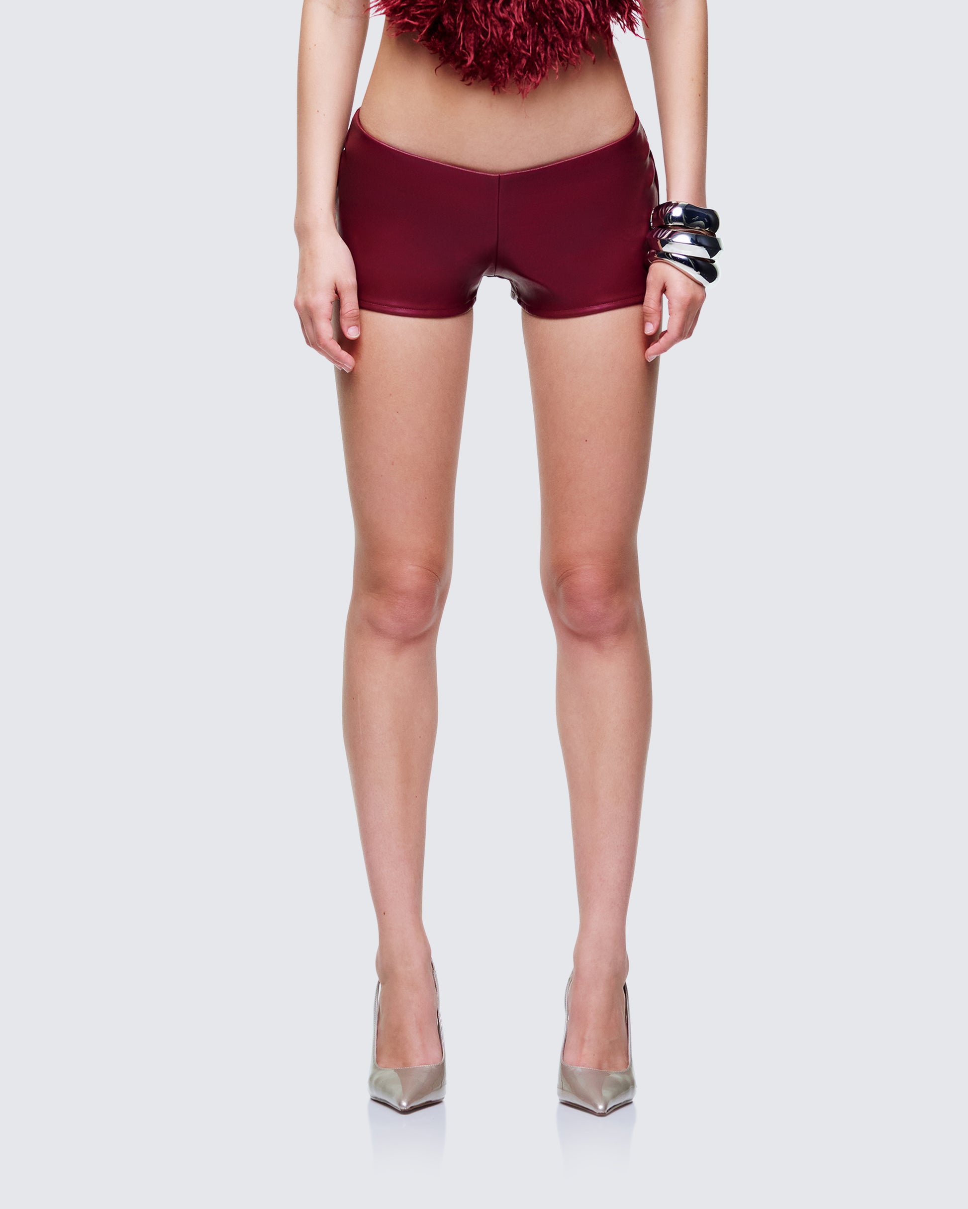 Najwa Red Vegan Leather Booty Shorts model front