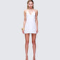Navi Ivory Embroidered Open Back Mini Dress model front