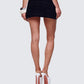 Women's black mini skirt close-up detail – FINESSE