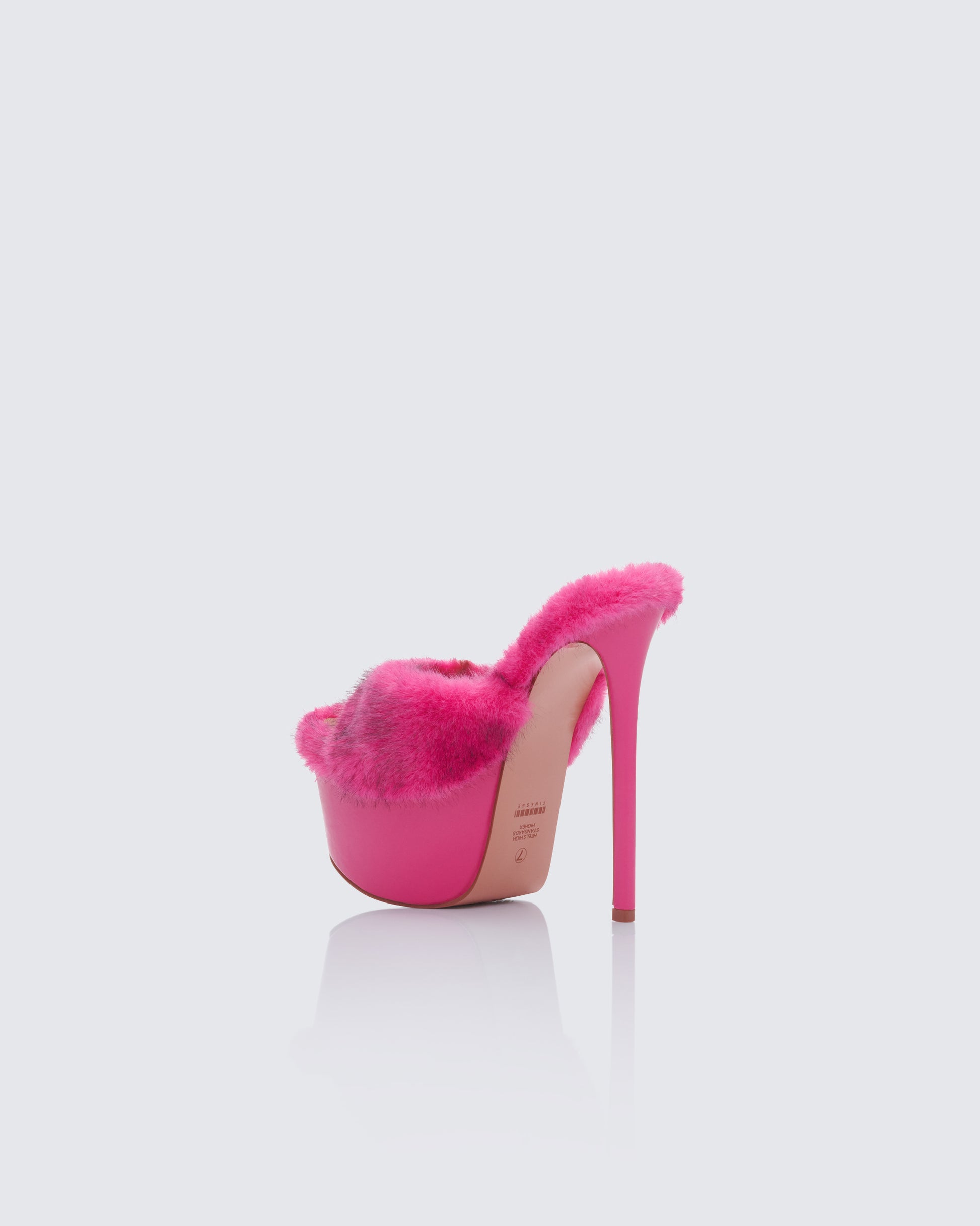 Women's pink platform heels styled on model – FINESSE
