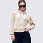Women's beige jacket styled on model – FINESSE